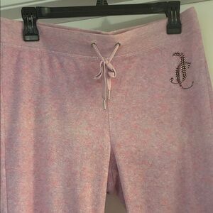 Juicy Couture light pink vintage sweatpants in a medium. Waist 34 inches.
